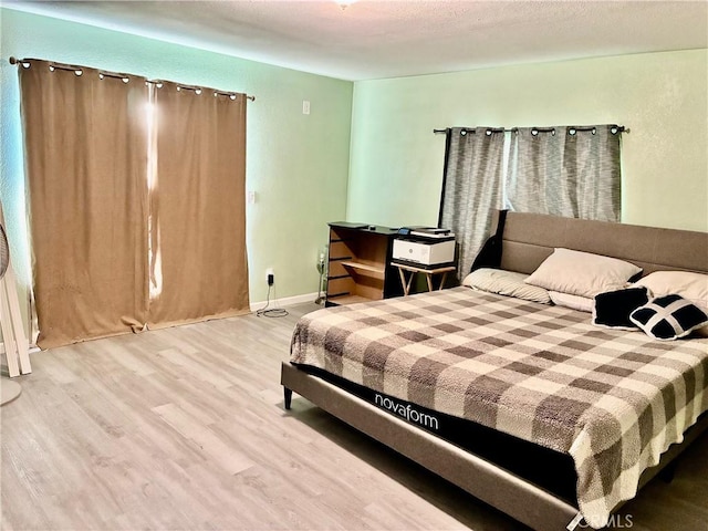15400 Don Roberto Rd, Victorville, CA 92394 - bedroom featuring wood finished floors and baseboards
