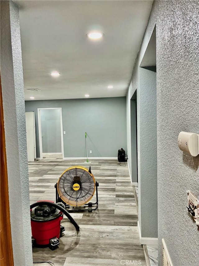 15400 Don Roberto Rd, Victorville, CA 92394 - interior space with wood finished floors, a textured wall, and recessed lighting
