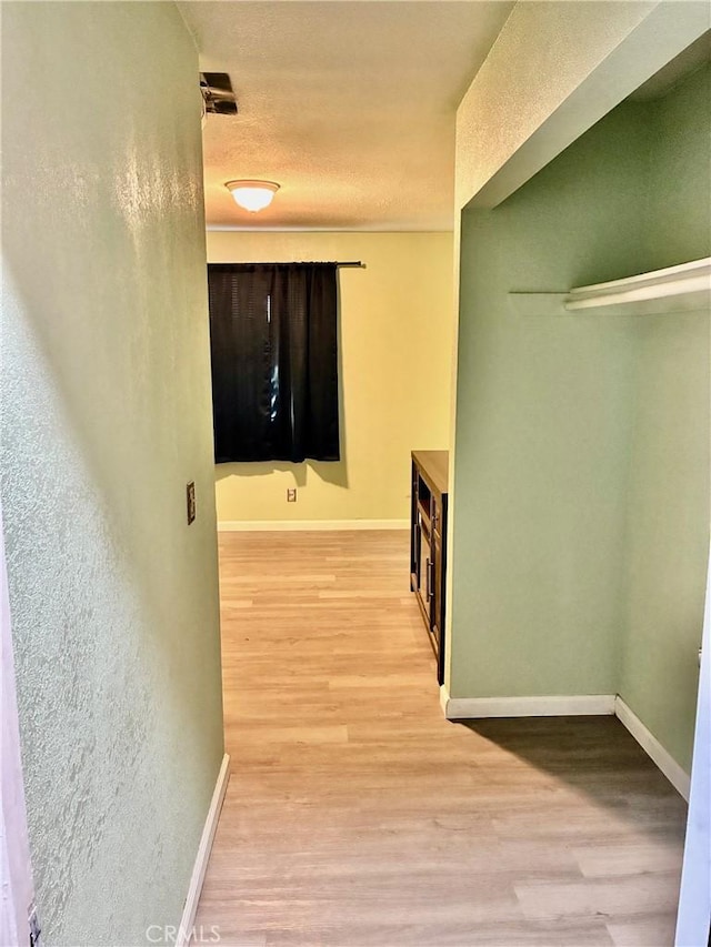15400 Don Roberto Rd, Victorville, CA 92394 - corridor with light wood-type flooring and baseboards
