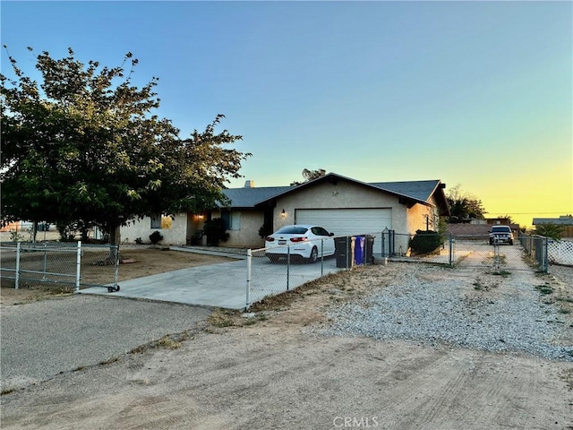15400 Don Roberto Rd, Victorville, CA 92394 - single story home featuring a gate, driveway, a garage, and stucco siding