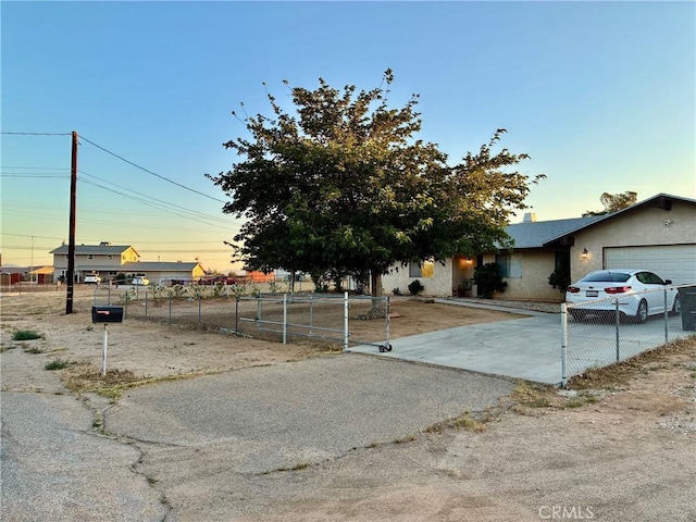 15400 Don Roberto Rd, Victorville, CA 92394 - view of front facade with driveway and an attached garage