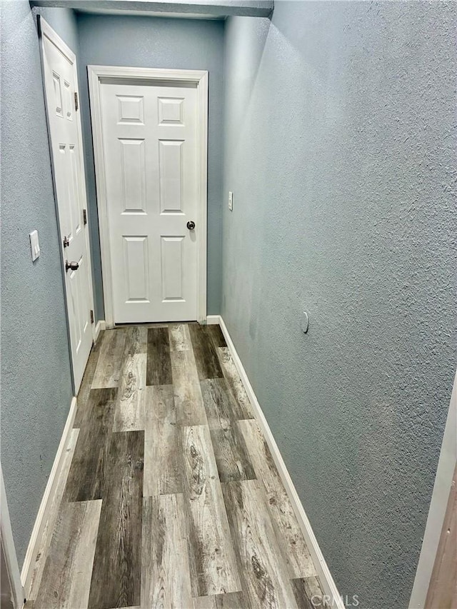 15400 Don Roberto Rd, Victorville, CA 92394 - hallway with wood finished floors and a textured wall