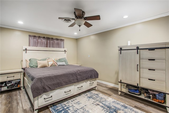 5169 Telefair Way, Riverside, CA 92506 - bedroom with wood finished floors, recessed lighting, crown molding, a barn door, and ceiling fan
