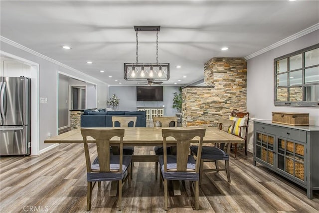 5169 Telefair Way, Riverside, CA 92506 - dining area with wood finished floors, crown molding, and recessed lighting