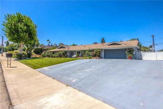 5169 Telefair Way, Riverside, CA 92506 - ranch-style home featuring an attached garage and driveway