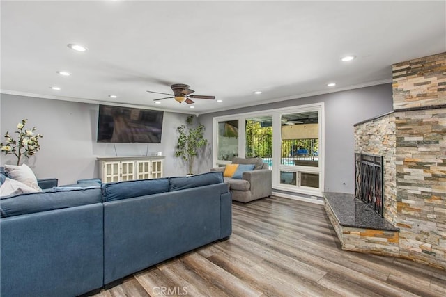 5169 Telefair Way, Riverside, CA 92506 - living area featuring recessed lighting, ceiling fan, crown molding, wood finished floors, and a fireplace
