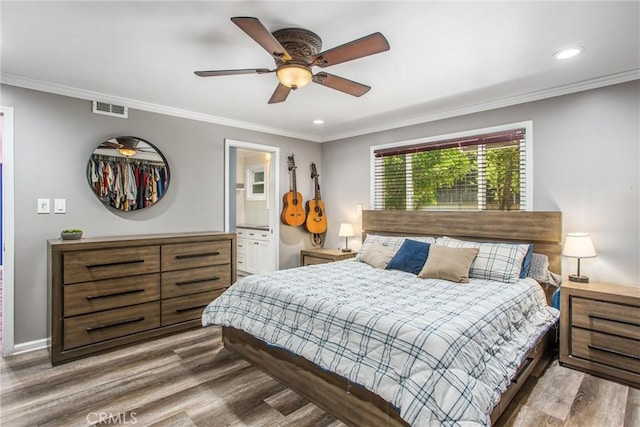 5169 Telefair Way, Riverside, CA 92506 - bedroom featuring wood finished floors, recessed lighting, crown molding, ceiling fan, and connected bathroom