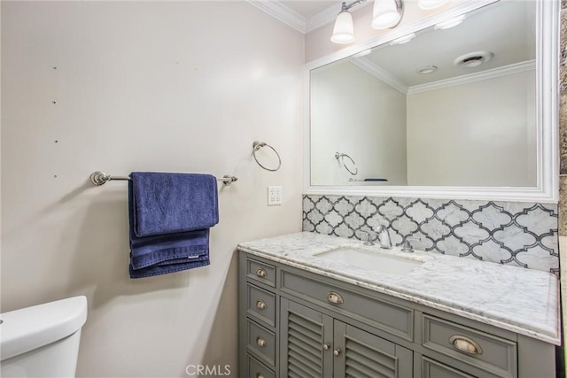 5169 Telefair Way, Riverside, CA 92506 - half bathroom featuring vanity, crown molding, and decorative backsplash