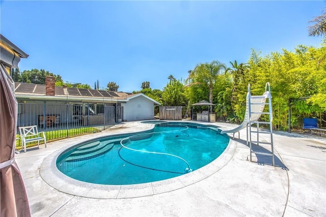 5169 Telefair Way, Riverside, CA 92506 - view of pool with a water slide and a patio area