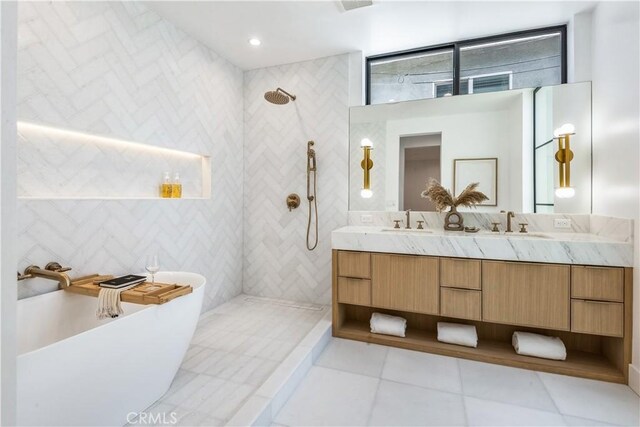 2007 Ava Ave, Hermosa Beach, CA 90254 - full bathroom with double vanity, a walk in shower, a freestanding bath, and tile patterned floors