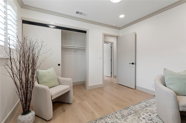 11861 Amethyst St, Garden Grove, CA 92845 - living area with light wood-style floors, crown molding, and recessed lighting