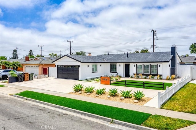 11861 Amethyst St, Garden Grove, CA 92845 - view of front of home with an attached garage, driveway, and stucco siding