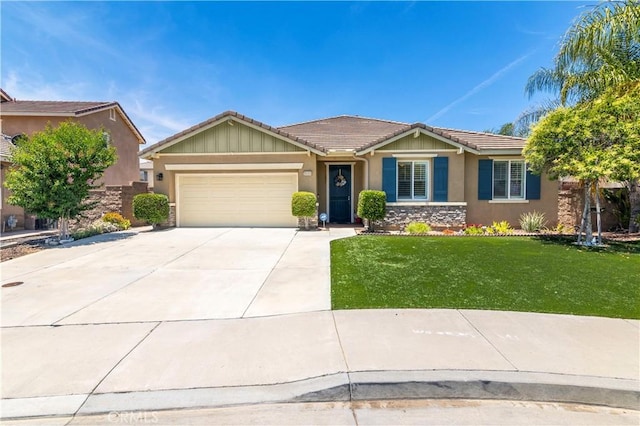 26865 Shelter Cove Ct, Menifee, CA 92585 - ranch-style house featuring stone siding, stucco siding, a tiled roof, and a garage