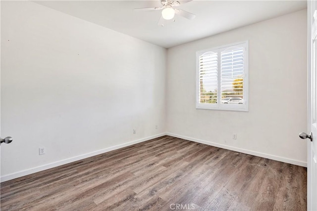 26865 Shelter Cove Ct, Menifee, CA 92585 - spare room with wood finished floors and ceiling fan