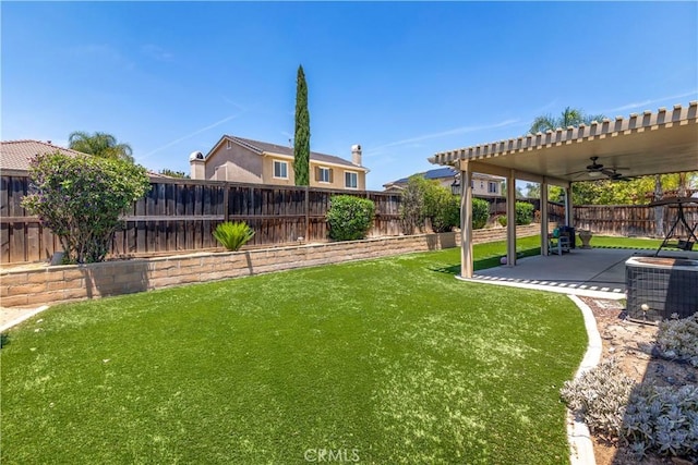 26865 Shelter Cove Ct, Menifee, CA 92585 - fenced backyard featuring a ceiling fan and a patio