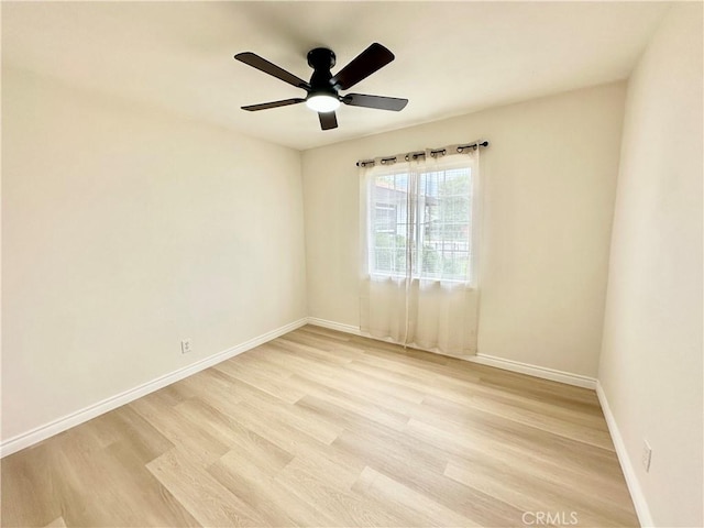 1439 Sheridan Rd, San Bernardino, CA 92407 - unfurnished room with light wood-style floors and a ceiling fan
