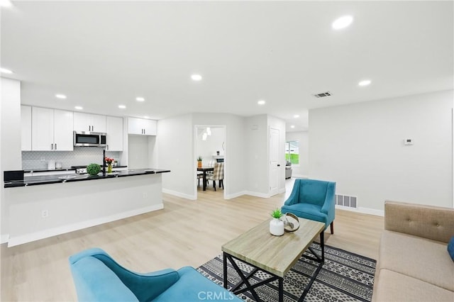 6304 Pablo Ct, Chino, CA 91710 - living room with light wood-type flooring and recessed lighting