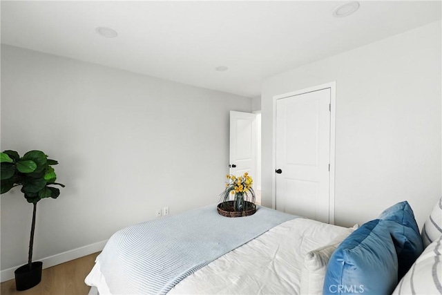 6304 Pablo Ct, Chino, CA 91710 - bedroom with wood finished floors and baseboards