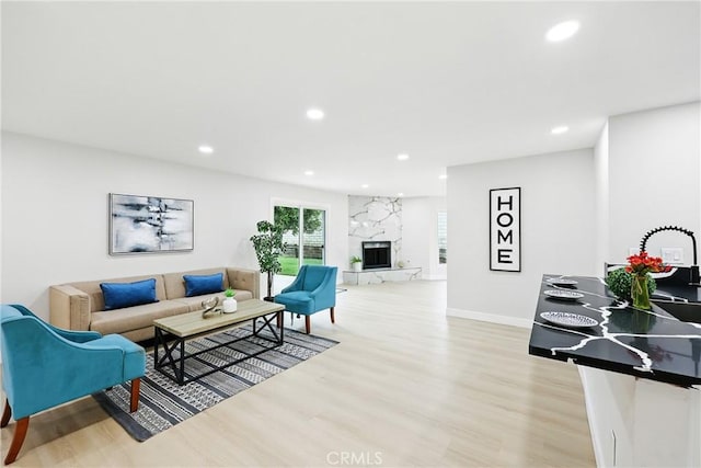 6304 Pablo Ct, Chino, CA 91710 - living room with light wood-style floors, recessed lighting, and a high end fireplace