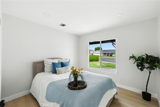 6304 Pablo Ct, Chino, CA 91710 - bedroom with wood finished floors and recessed lighting