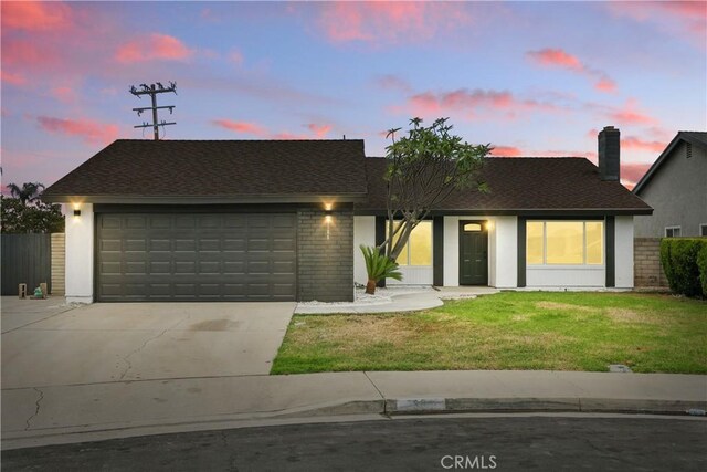 6304 Pablo Ct, Chino, CA 91710 - view of front facade featuring driveway, an attached garage, roof with shingles, and stucco siding