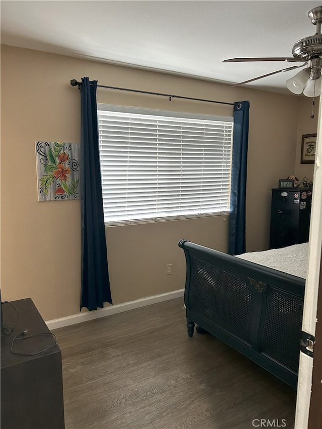 826 Railroad St, Corona, CA 92882 - bedroom featuring wood finished floors and a ceiling fan