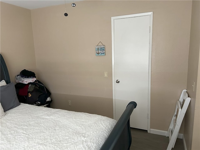 826 Railroad St, Corona, CA 92882 - bedroom featuring baseboards and wood finished floors