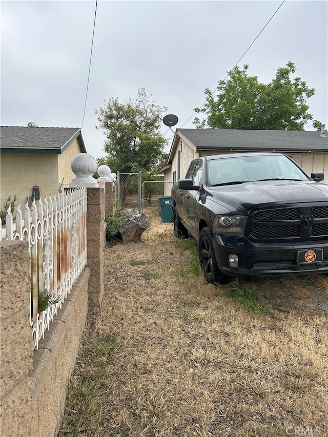 826 Railroad St, Corona, CA 92882 - view of yard featuring a gate