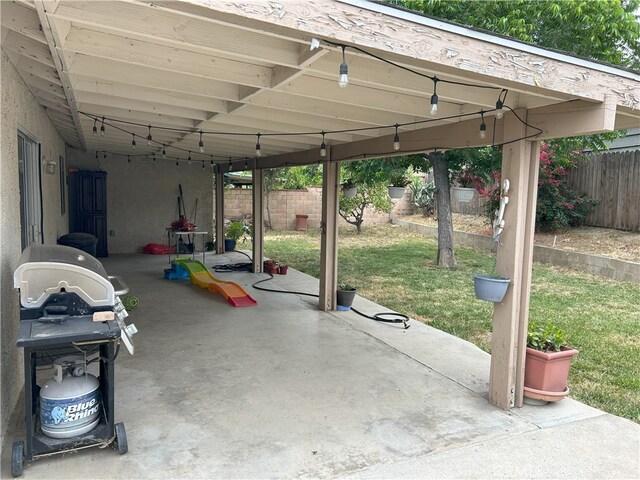 826 Railroad St, Corona, CA 92882 - fenced backyard featuring a patio and grilling area