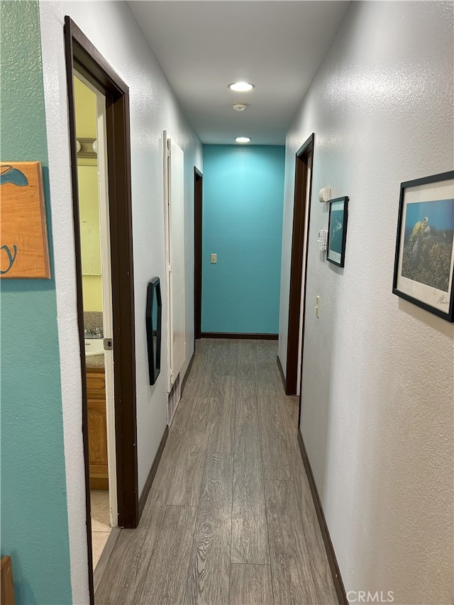 826 Railroad St, Corona, CA 92882 - hallway featuring wood finished floors and baseboards