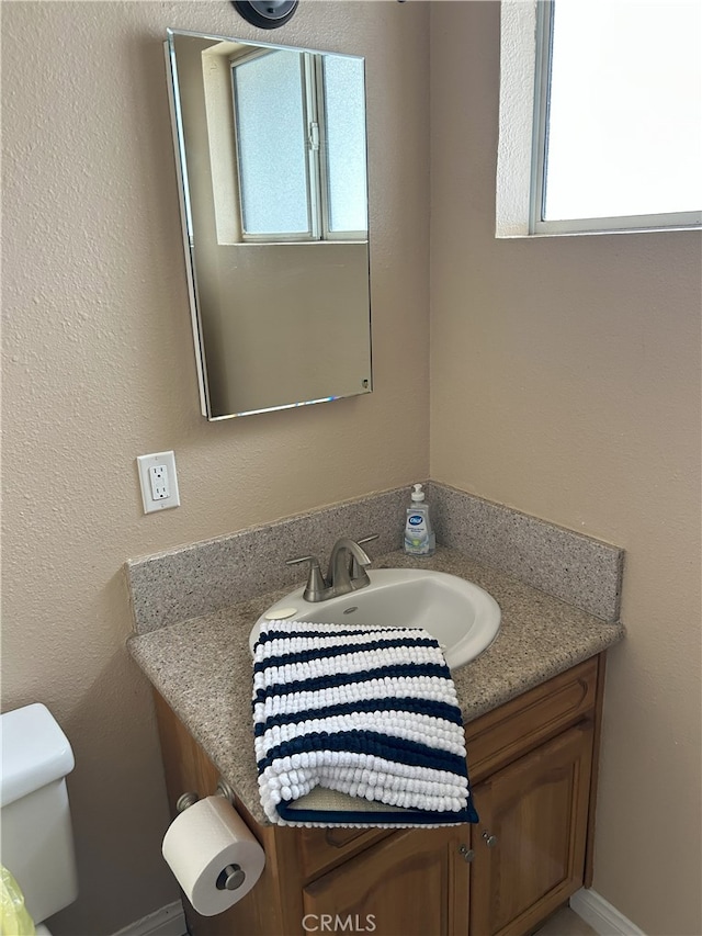 826 Railroad St, Corona, CA 92882 - bathroom featuring vanity and healthy amount of natural light