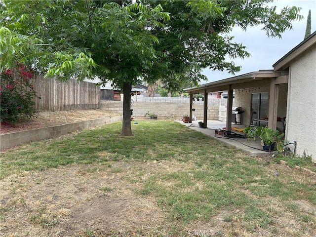 826 Railroad St, Corona, CA 92882 - fenced backyard featuring a patio area