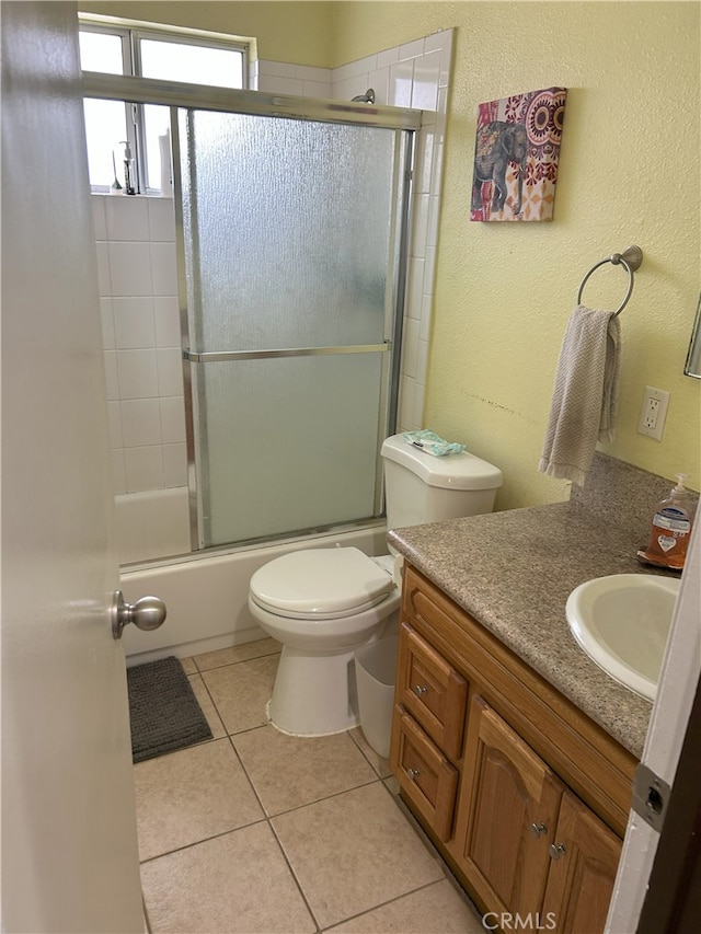 826 Railroad St, Corona, CA 92882 - full bath with vanity, tile patterned floors, and enclosed tub / shower combo