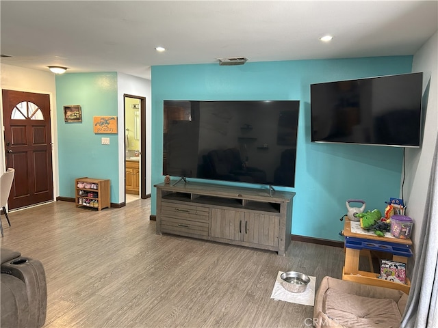 826 Railroad St, Corona, CA 92882 - living room with light wood-style flooring and recessed lighting