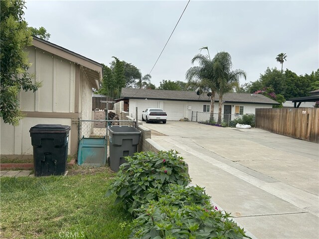 826 Railroad St, Corona, CA 92882 - view of front of home with concrete driveway and an attached garage