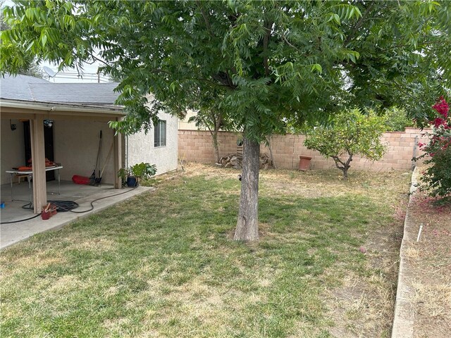 826 Railroad St, Corona, CA 92882 - fenced backyard featuring a patio