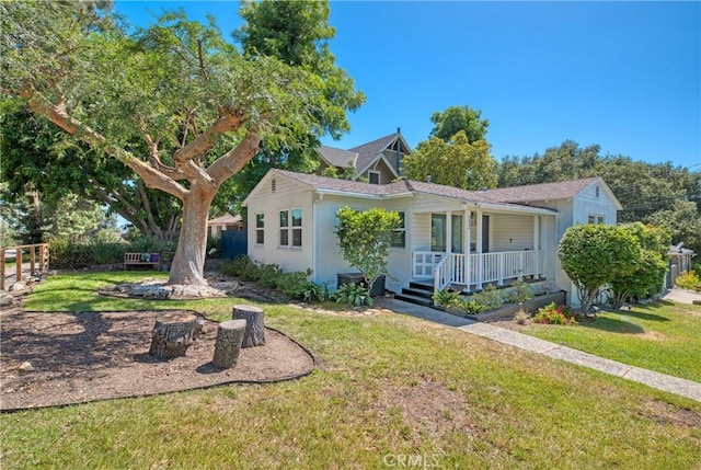 252 E Scenic Dr, Monrovia, CA 91016 - view of front of home featuring covered porch, a front lawn, and stucco siding