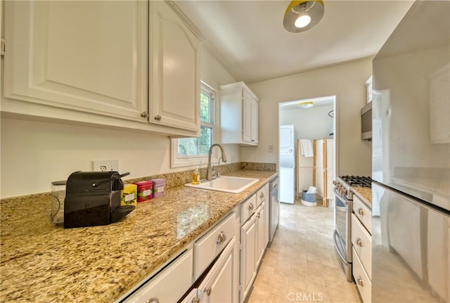 252 E Scenic Dr, Monrovia, CA 91016 - kitchen with stainless steel appliances, light stone counters, and white cabinets