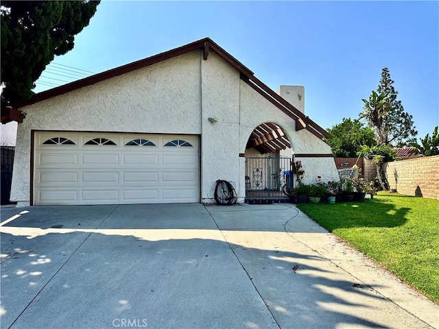17105 Holmes Cir, Cerritos, CA 90703 - view of front of home featuring concrete driveway, stucco siding, and a garage