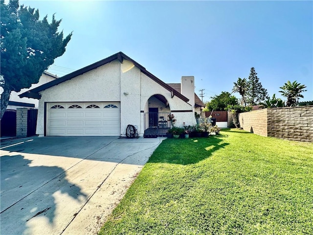 17105 Holmes Cir, Cerritos, CA 90703 - view of front of home with driveway, an attached garage, and stucco siding