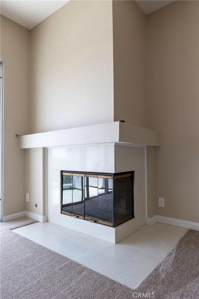 54 Los Cabos, Dana Point, CA 92629 - detailed view of a multi sided fireplace and carpet flooring