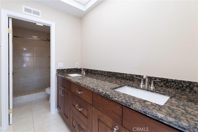 54 Los Cabos, Dana Point, CA 92629 - bathroom featuring double vanity, a shower stall, and tile patterned floors