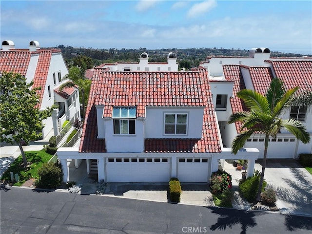 54 Los Cabos, Dana Point, CA 92629 - mediterranean / spanish house with a tiled roof, a garage, stucco siding, and driveway