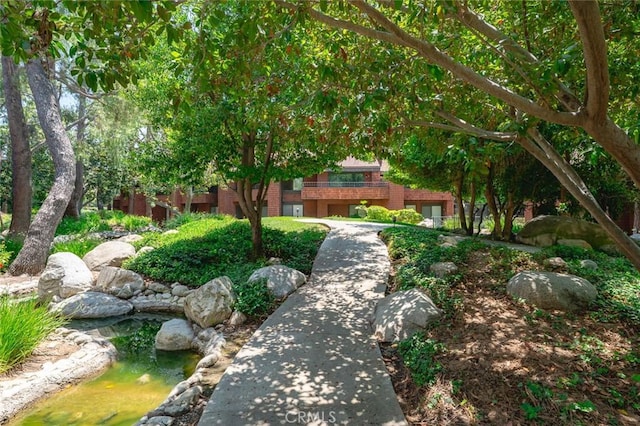 394 S Prospectors Rd Unit 102, Diamond Bar, CA 91765 - view of yard with a small pond