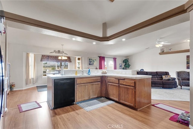 10776 Joshua St, Oak Hills, CA 92344 - kitchen featuring dishwasher, light wood finished floors, open floor plan, recessed lighting, and brown cabinetry