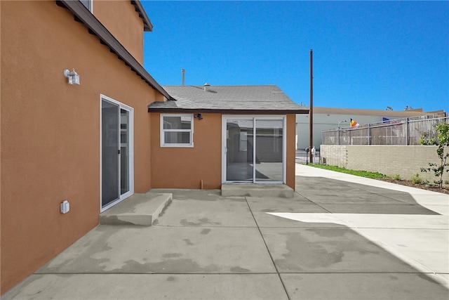 3032 Cogswell Rd, El Monte, CA 91732 - rear view of house featuring stucco siding and a patio area
