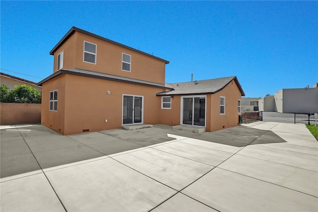 3032 Cogswell Rd, El Monte, CA 91732 - rear view of property featuring stucco siding, a patio, and entry steps