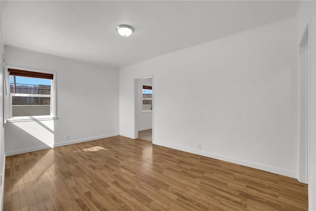 3032 Cogswell Rd, El Monte, CA 91732 - unfurnished room with wood finished floors and baseboards