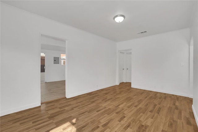 3032 Cogswell Rd, El Monte, CA 91732 - unfurnished room featuring light wood-style flooring and electric panel