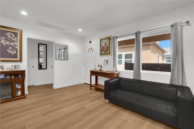 3032 Cogswell Rd, El Monte, CA 91732 - sitting room with light wood-style flooring and recessed lighting